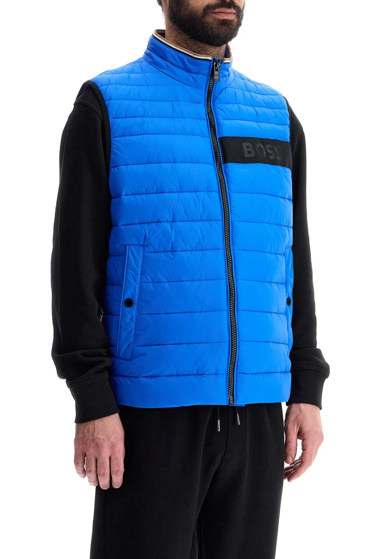 BRIGHT BLUE QUILTED GILET WITH HIGH COLLAR AND ZIP