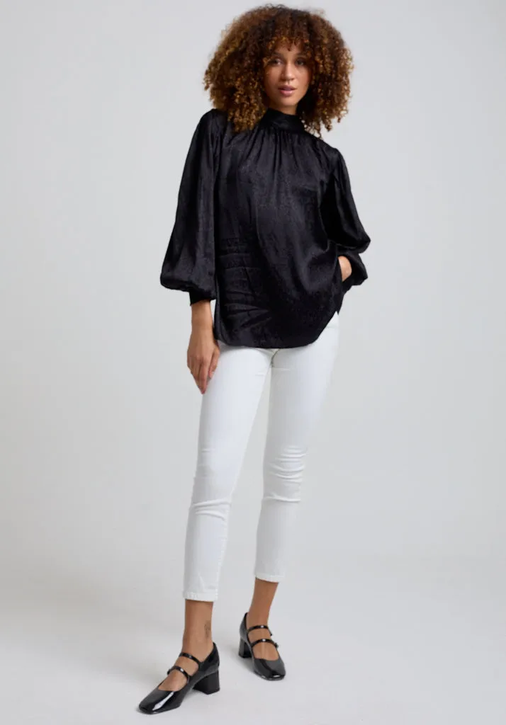 Molly Turtle Neck Animal Blouse In Black